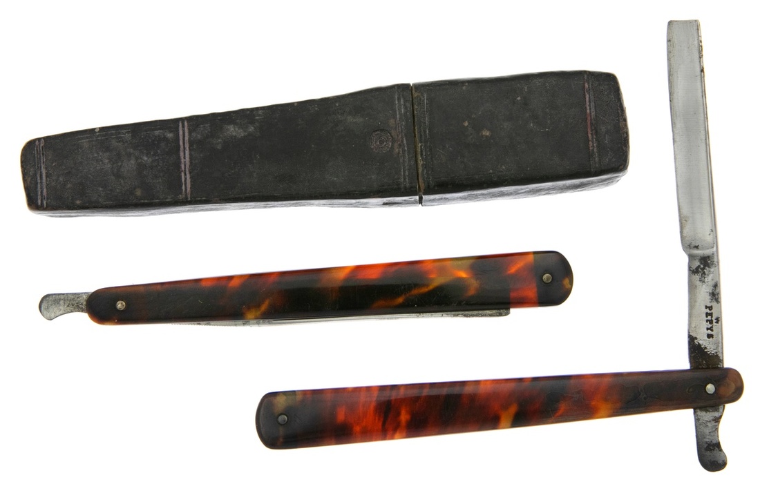 147 - Tortoise Shell Handles. Two razors in case; one by Pepys the oth...