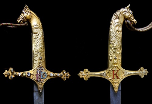 Crossed swords beneath a crown?